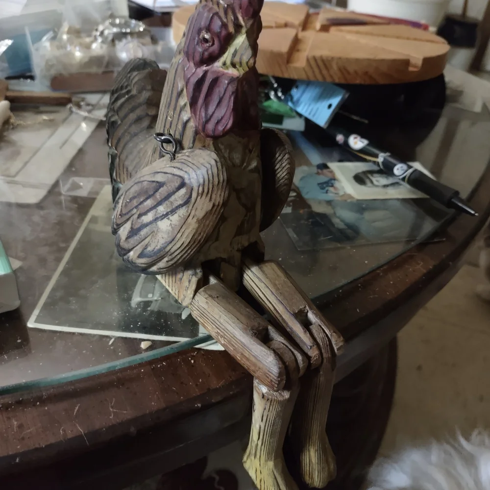 Wooden Bird Figurine with Purple and Brown Accents